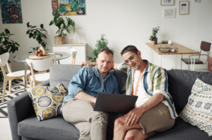 a gay couple doing virtual couples therapy